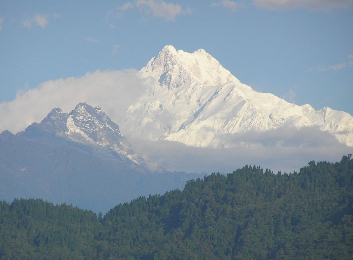 Kangchenjunga massif seen from the air, snow-covered peaks on the Nepal–Sikkim border in the Himalaya