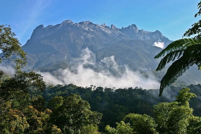 Aerial view of Mount Kinabalu's bare granite summit above the rainforest of Sabah, Borneo, Malaysia